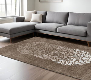 Homeroots 3' Beige Tan And Taupe Abstract Washable Area Rug For Indoor And Outdoor High Traffic Spaces 9' X 12' Polyester 579803