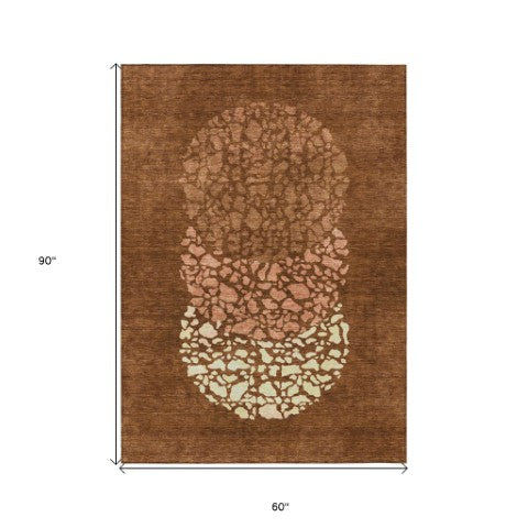 Homeroots 3' Beige Tan And Taupe Abstract Washable Area Rug For Indoor And Outdoor High Traffic Spaces 5' X 8' Polyester 579818