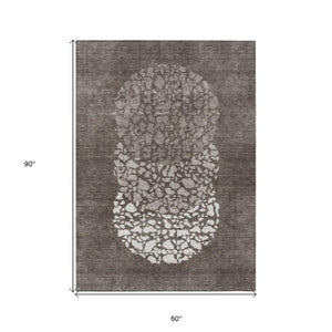Homeroots 3' Beige Tan And Taupe Abstract Washable Area Rug For Indoor And Outdoor High Traffic Spaces 5' X 8' Polyester 579824