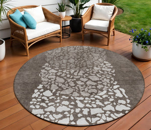 Homeroots 3' Beige Tan And Taupe Abstract Washable Area Rug For Indoor And Outdoor High Traffic Spaces 8' Round Polyester 579825
