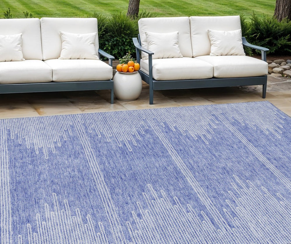 HomeRoots 9' Denim Blue and Ivory Abstract Area Rug – Stylish, Washable Design for Indoor and Outdoor Spaces 9' X 12' 579899