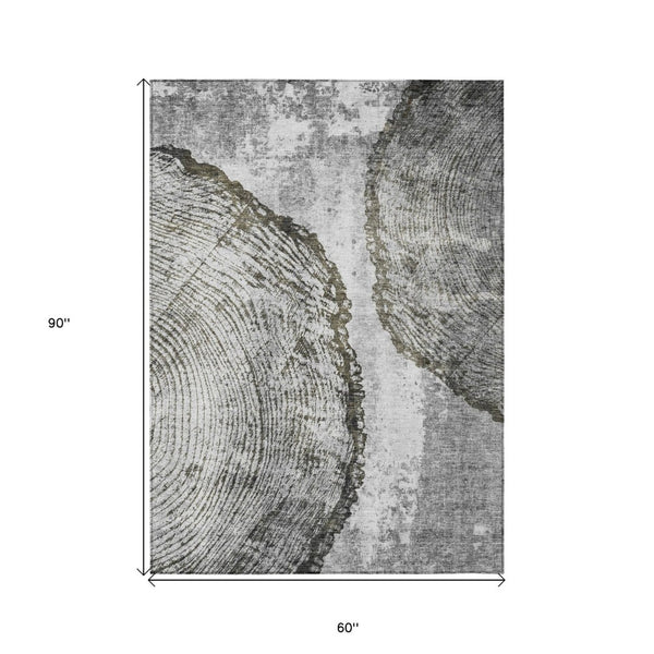 HomeRoots 5' Gray Taupe and Silver Abstract Area Rug - Washable, Durable, and Versatile for Indoor/Outdoor Use 5' X 8' 579938