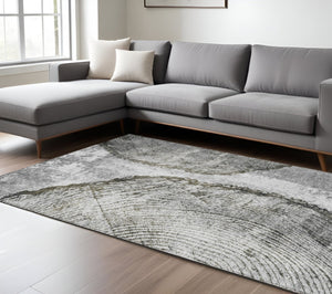 HomeRoots 5' Gray Taupe and Silver Abstract Area Rug - Washable, Durable, and Versatile for Indoor/Outdoor Use 8' X 10' 579940