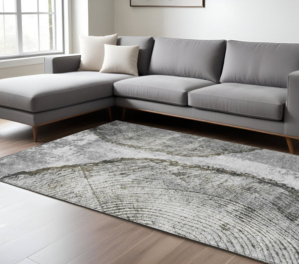 HomeRoots 5' Gray Taupe and Silver Abstract Area Rug - Washable, Durable, and Versatile for Indoor/Outdoor Use 8' X 10' 579940