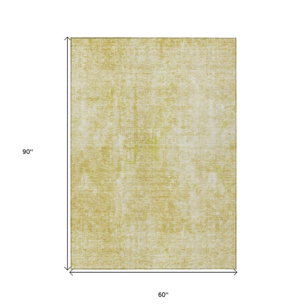 HomeRoots 5' Gold Wheat and Ivory Abstract Area Rug - Washable, Durable, Perfect for Indoor and Outdoor Spaces 5' X 8' 580251