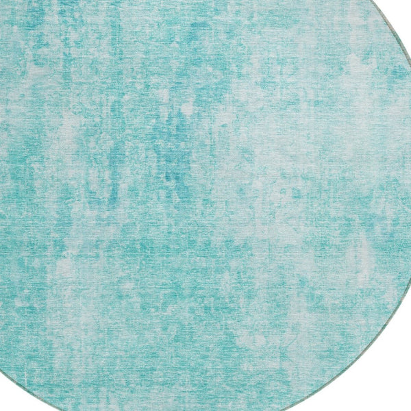 HomeRoots 5' Teal Blue and Ivory Abstract Area Rug - Stylish, Washable, Durable for Indoor and Outdoor Use 8' Round 580270