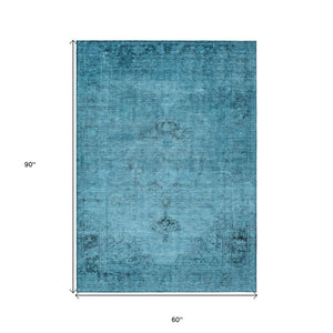HomeRoots 5' Denim Blue and Navy Oriental Area Rug - Durable, Washable Design for Indoor and Outdoor Spaces 5' X 8' 580329