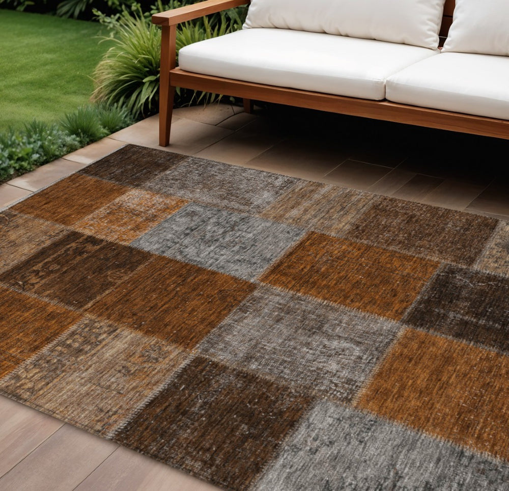 HomeRoots 9' Vibrant Orange and Taupe Patchwork Area Rug - Durable, Washable for Indoor and Outdoor Spaces 9' X 12' 580662