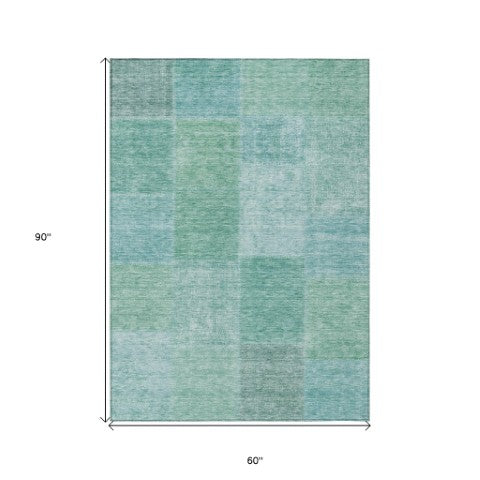 Homeroots 3' Stylish Green Copper And Mint Patchwork Washable Rug For Indoor Outdoor Spaces, Durable & Versatile 5' X 8' Polyester 580695