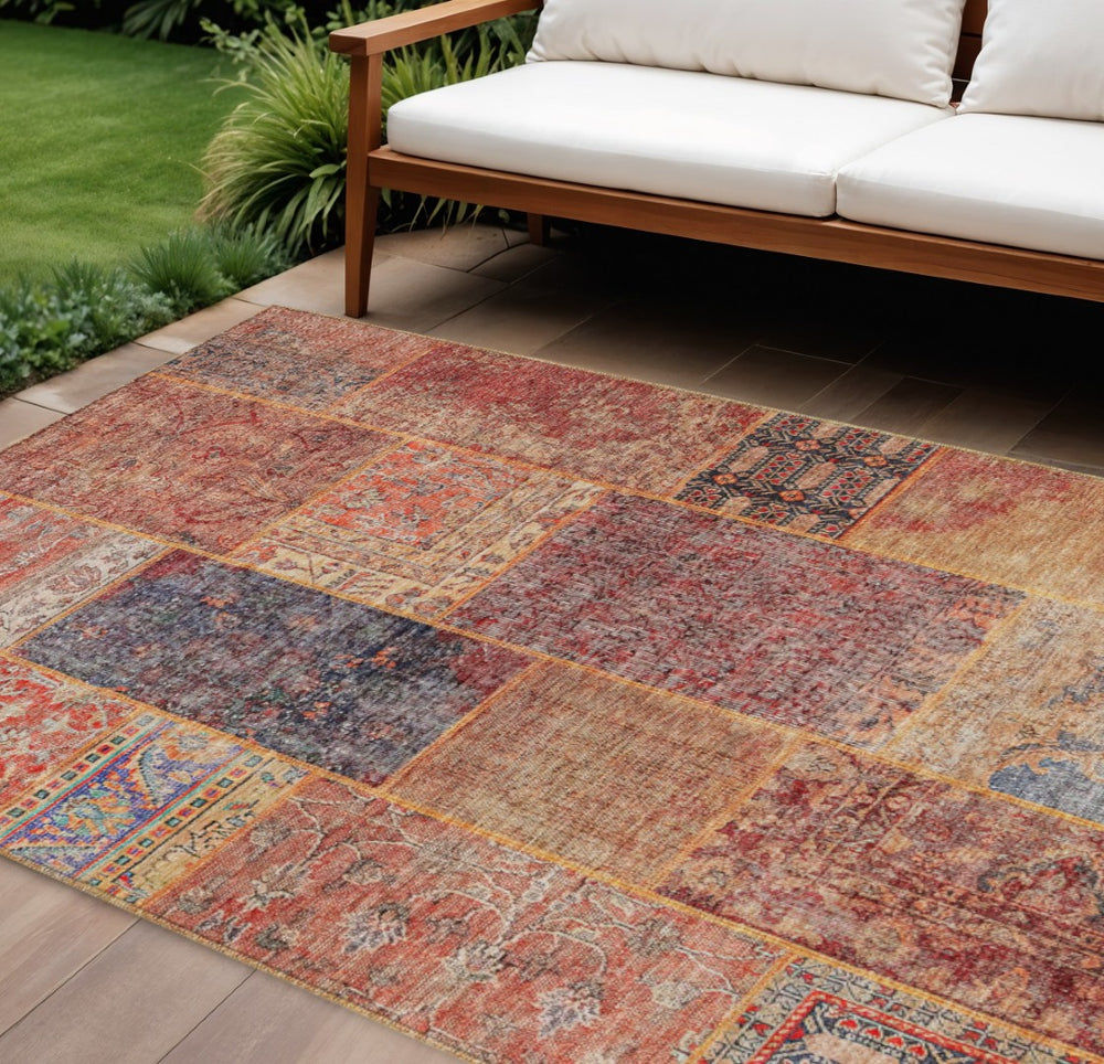 HomeRoots 9' Vibrant Red, Orange, and Blue Patchwork Area Rug - Durable, Washable, Indoor/Outdoor Versatility 9' X 12' 580920