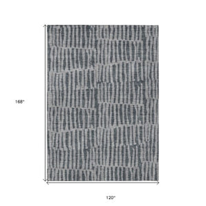 Homeroots 3' Stylish Beige And Tan Striped Washable Area Rug For Indoor And Outdoor Spaces, Durable Design 10' X 14' Polyester 581136