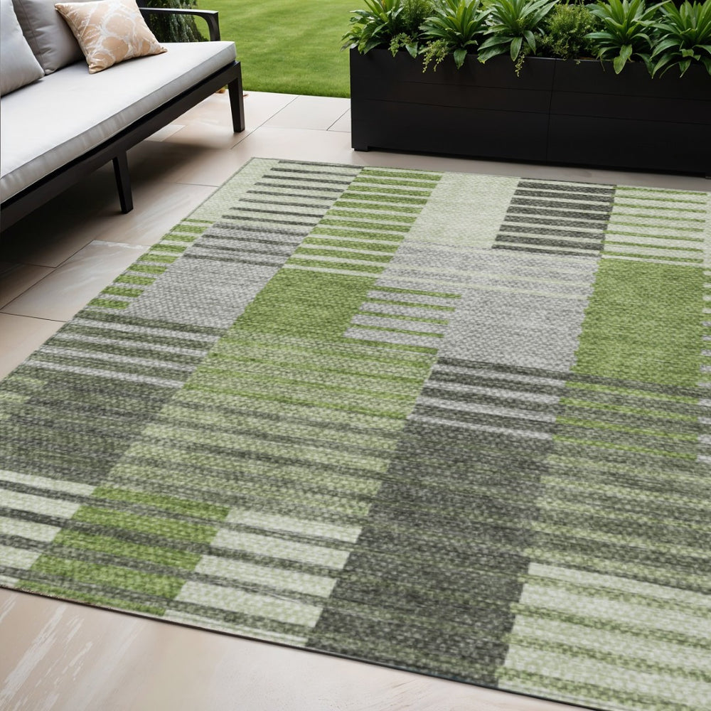 HomeRoots 5' Green and Olive Striped Area Rug - Stylish Indoor/Outdoor Comfort, Washable & Durable Design 5' X 8' 581696