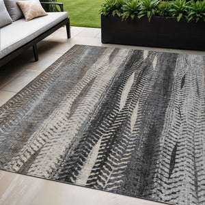 Homeroots 3' Stylish Botanical Leaves Indoor Outdoor Area Rug - Durable, Washable, And Versatile For Any Space 5' X 8' Polyester 581931