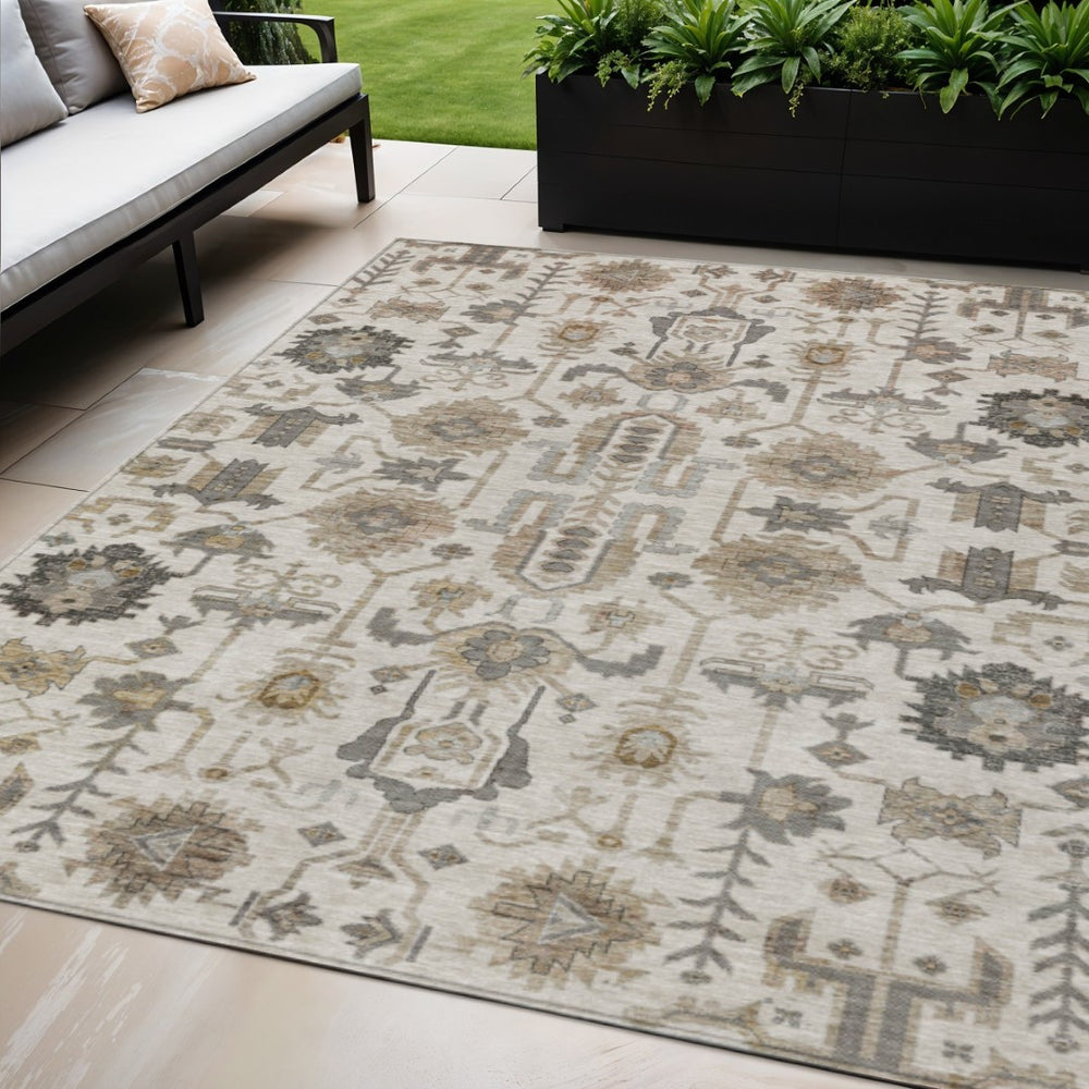 HomeRoots 5' Timeless Ivory Beige and Taupe Oriental Washable Rug for Indoor and Outdoor Versatility 5' X 8' 582087