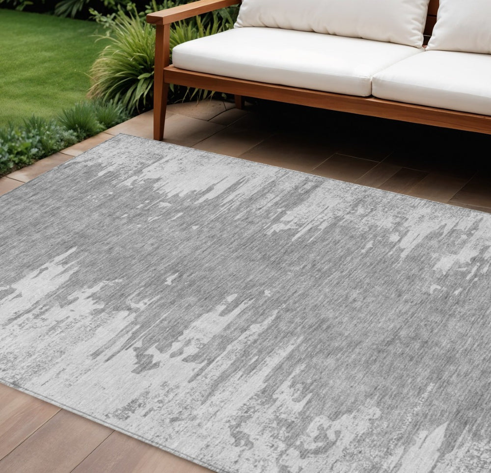 HomeRoots 9' Silver Gray and Ivory Abstract Washable Area Rug - Ideal for Indoor and Outdoor High-Traffic Spaces 9' X 12' 582444
