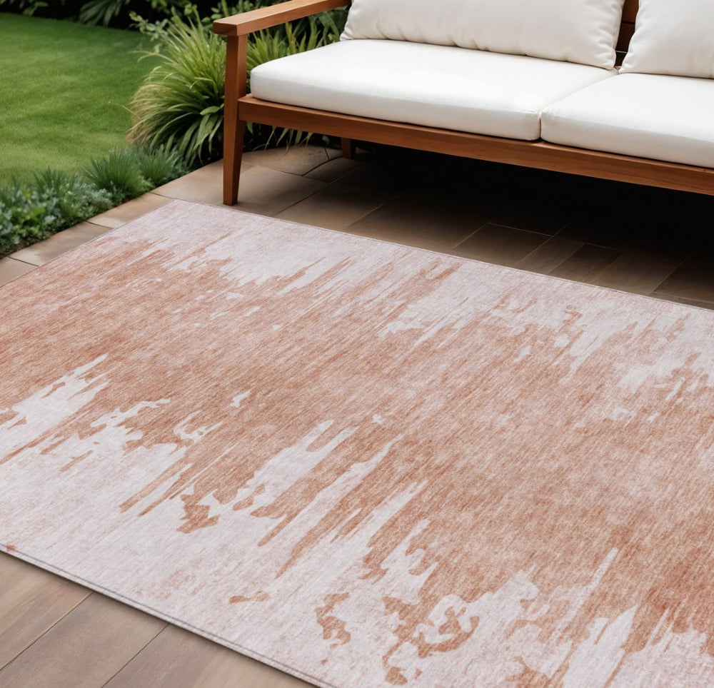 HomeRoots 9' Durable Terra Cotta Abstract Area Rug – Stylish, Washable Design for Indoor & Outdoor Spaces 9' X 12' 582456