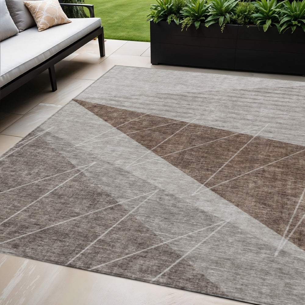 HomeRoots 5' Versatile Gray Silver and Taupe Geometric Washable Area Rug for Indoor and Outdoor Spaces 5' X 8' 582471