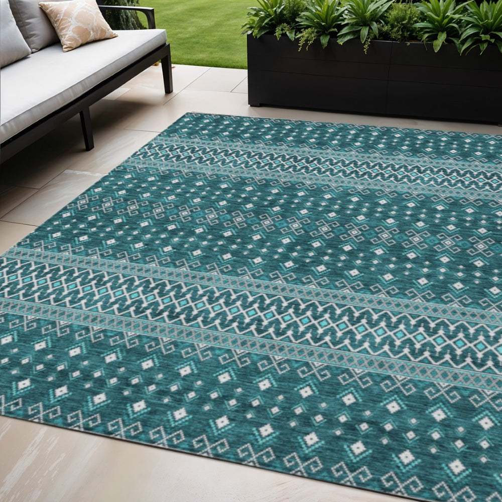 HomeRoots 5' Teal Blue Aqua and Ivory Tribal Area Rug - Stylish, Durable Indoor/Outdoor Accent for Any Space 5' X 8' 582591