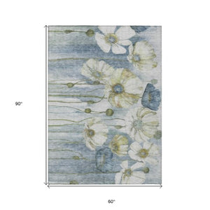 Homeroots 3' Denim Blue Floral Washable Area Rug - Perfect For Indoor Outdoor Spaces, Stain Resistant Design 5' X 8' Polyester 582747