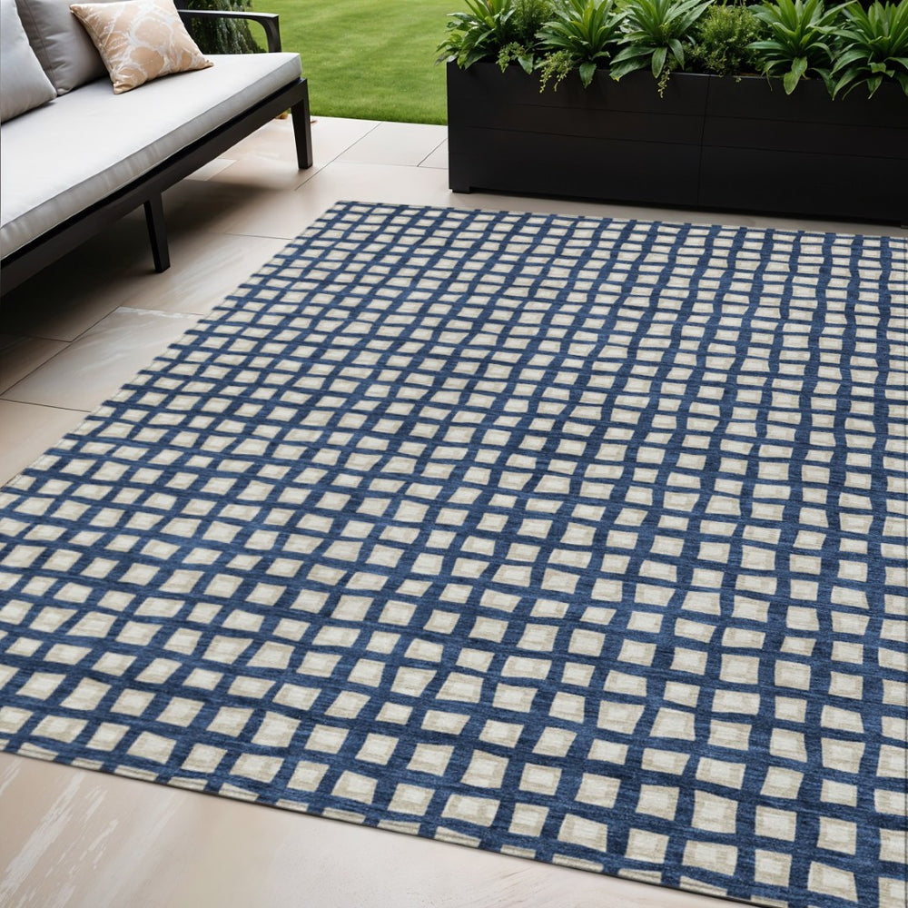 HomeRoots 5' Navy Blue and Ivory Geometric Area Rug - Durable, Washable, Indoor/Outdoor Style for High-Traffic Spaces 5' X 8' 583277