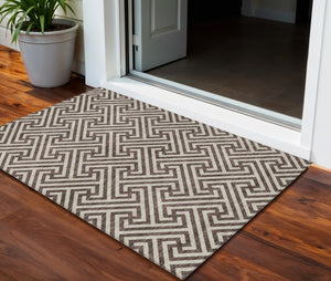 Homeroots 3' Black And Ivory Geometric Washable Area Rug For Indoor And Outdoor Spaces, Durable & Stylish 3' X 5' Polyester 583564