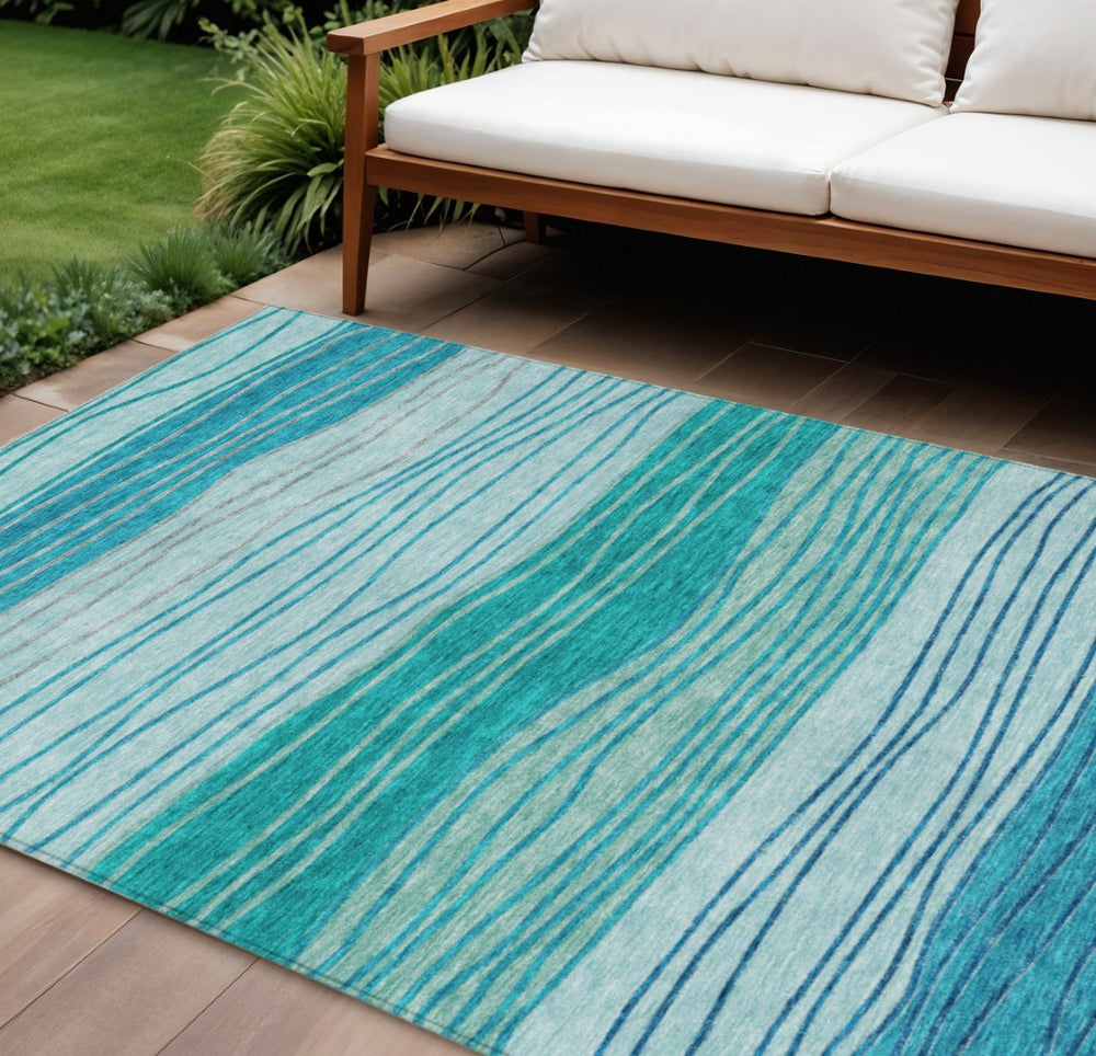HomeRoots 5' Coastal Striped Area Rug in Sky Blue, Teal, and Aqua - Washable for Indoor and Outdoor Use 10' X 14' 583887