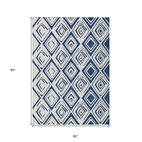 HomeRoots 5' Navy Blue and Ivory Geometric Area Rug - Stylish, Washable, Durable for Indoor and Outdoor Spaces 5' X 8' 583985