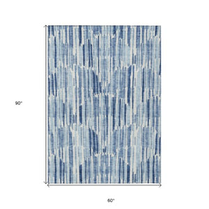 Homeroots 3' Aqua Teal Blue And Lime Green Abstract Washable Area Rug For Indoor And Outdoor Spaces 5' X 8' Polyester 584063