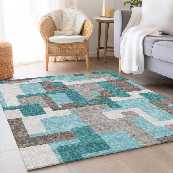 Homeroots 3' Beige Tan And Taupe Abstract Washable Area Rug For Indoor Or Outdoor Use - Durable Design 9' X 12' Polyester 584174