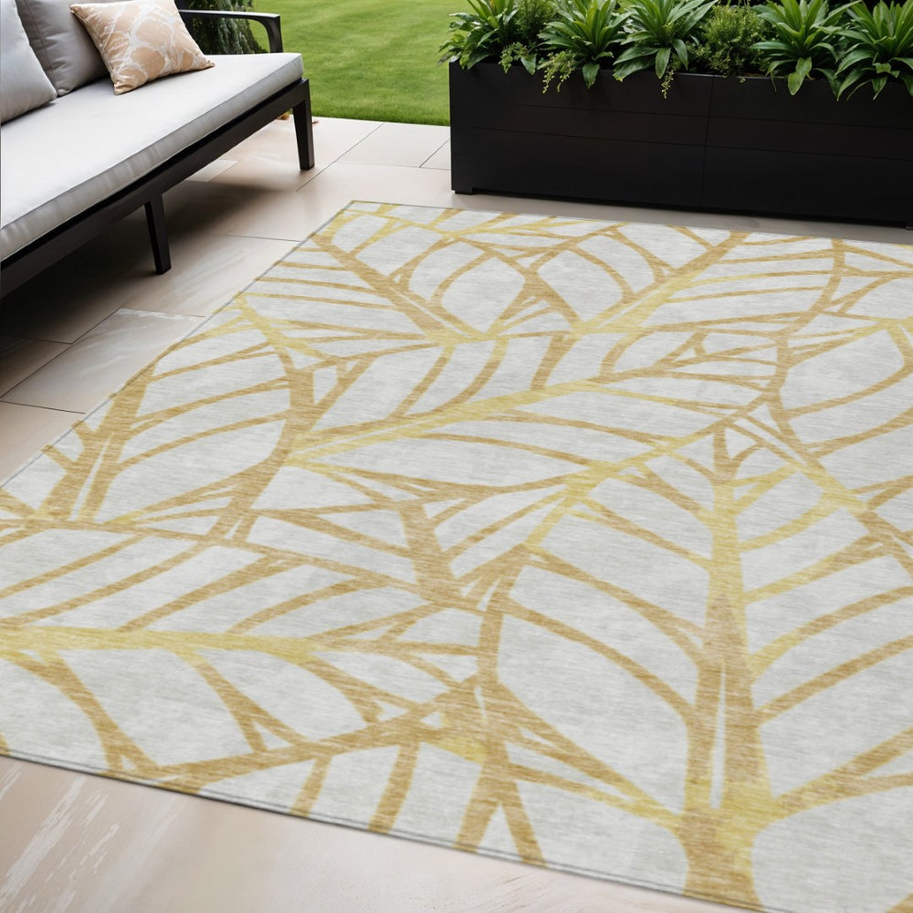 HomeRoots 5' Gold and Beige Floral Area Rug – Durable, Washable Design for Indoor and Outdoor Spaces 5' X 8' 584201
