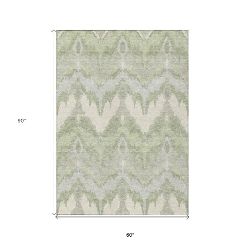 Homeroots 3' Artichoke Green And Beige Ikat Washable Area Rug - Perfect For Indoor And Outdoor Spaces 5' X 8' Polyester 584315