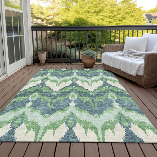 HomeRoots 5' Contemporary Green, Ivory, and Blue Ikat Washable Area Rug for Indoor and Outdoor Spaces 10' X 14' 584355