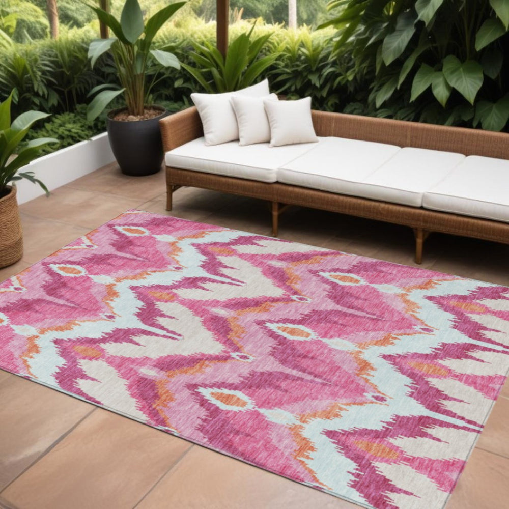 HomeRoots 9' Vibrant Pink Mauve and Orange Ikat Area Rug - Washable, Durable, Perfect for Indoor/Outdoor Use 9' X 12' 584372