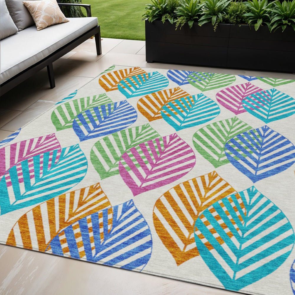 HomeRoots 5' Floral Indoor Outdoor Area Rug - Washable, Heavy-Duty Design with Vibrant Orange & Blue Accents 5' X 8' 584459