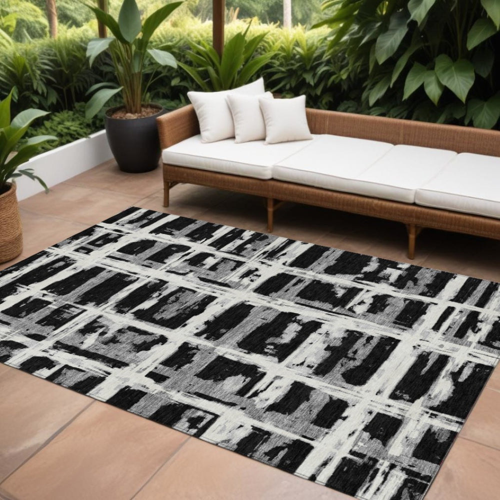 HomeRoots 5' Stylish Black Gray Silver Striped Area Rug - Durable, Washable, Perfect for Indoor & Outdoor Use 8' X 10' 584473