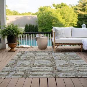 Homeroots 3' Stylish Beige Brown Taupe Striped Washable Area Rug For Indoor And Outdoor Comfort And Charm 5' X 8' Polyester 584531