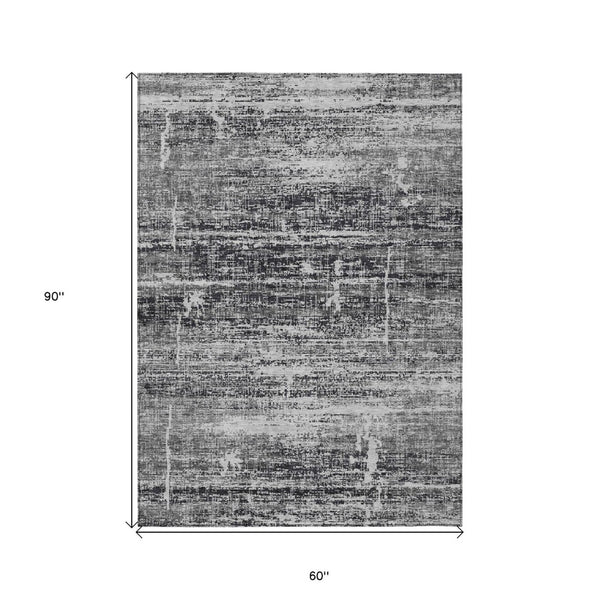 HomeRoots 5' Abstract Washable Area Rug in Black, Gray & Charcoal - Stylish Indoor/Outdoor Decor Solution 5' X 8' 584615