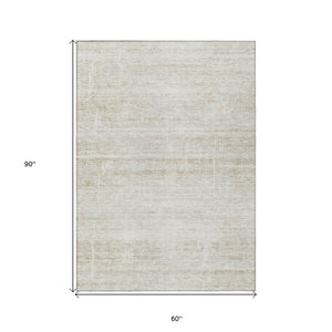 HomeRoots 5' Elegant Ivory Beige Tan Abstract Washable Area Rug for Indoor and Outdoor High-Traffic Spaces 5' X 8' 584639