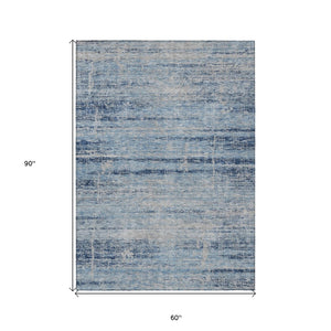 HomeRoots 5' Sky Blue and Navy Abstract Area Rug - Stylish Washable Design for Indoor and Outdoor Spaces 5' X 8' 584657