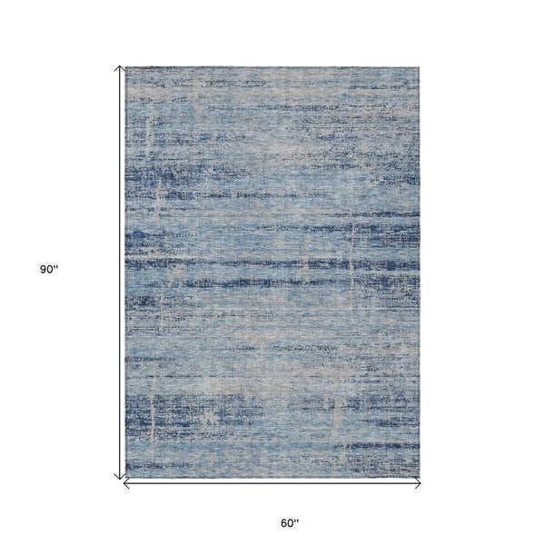 HomeRoots 5' Sky Blue and Navy Abstract Area Rug - Stylish Washable Design for Indoor and Outdoor Spaces 5' X 8' 584657