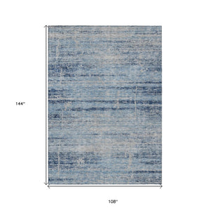 HomeRoots 9' Sky Blue and Navy Abstract Area Rug - Stylish, Washable, Indoor/Outdoor Solution for High-Traffic Areas 9' X 12' 584660