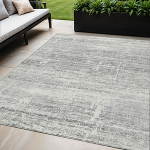 HomeRoots 5' Modern Silver Gray and Charcoal Abstract Area Rug - Durable, Washable for Indoor and Outdoor Use 5' X 8' 584663