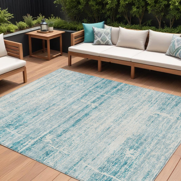 HomeRoots 9' Modern Abstract Teal Aqua and Ivory Area Rug for Indoor and Outdoor Spaces, Easy Care & Durable 9' X 12' 584672