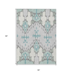 Homeroots 3' Creative Blush Pink And Ivory Ikat Washable Area Rug For Indoor Or Outdoor Spaces, Durable Design 5' X 8' Polyester 584705