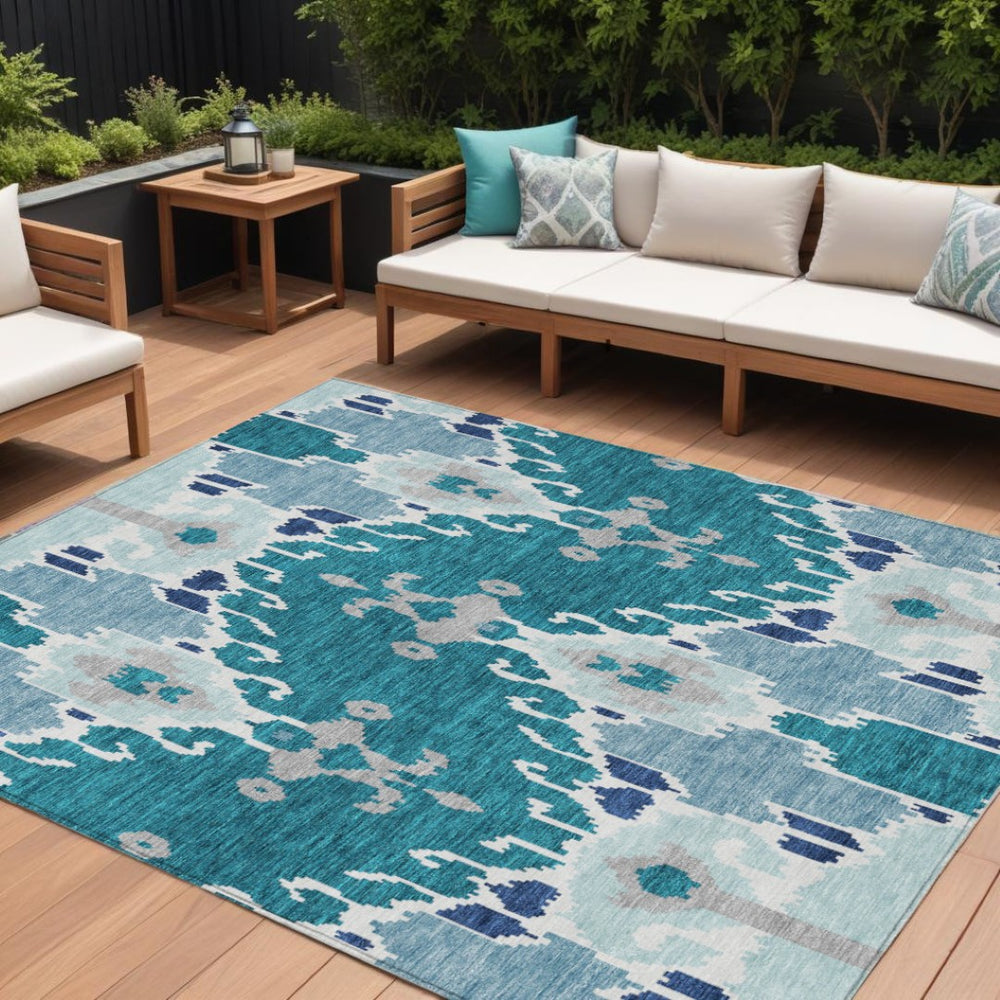 HomeRoots 9' Vibrant Ikat Area Rug in Teal, Navy, and Gray - Stylish Washable Design for Indoor & Outdoor Use 9' X 12' 584744