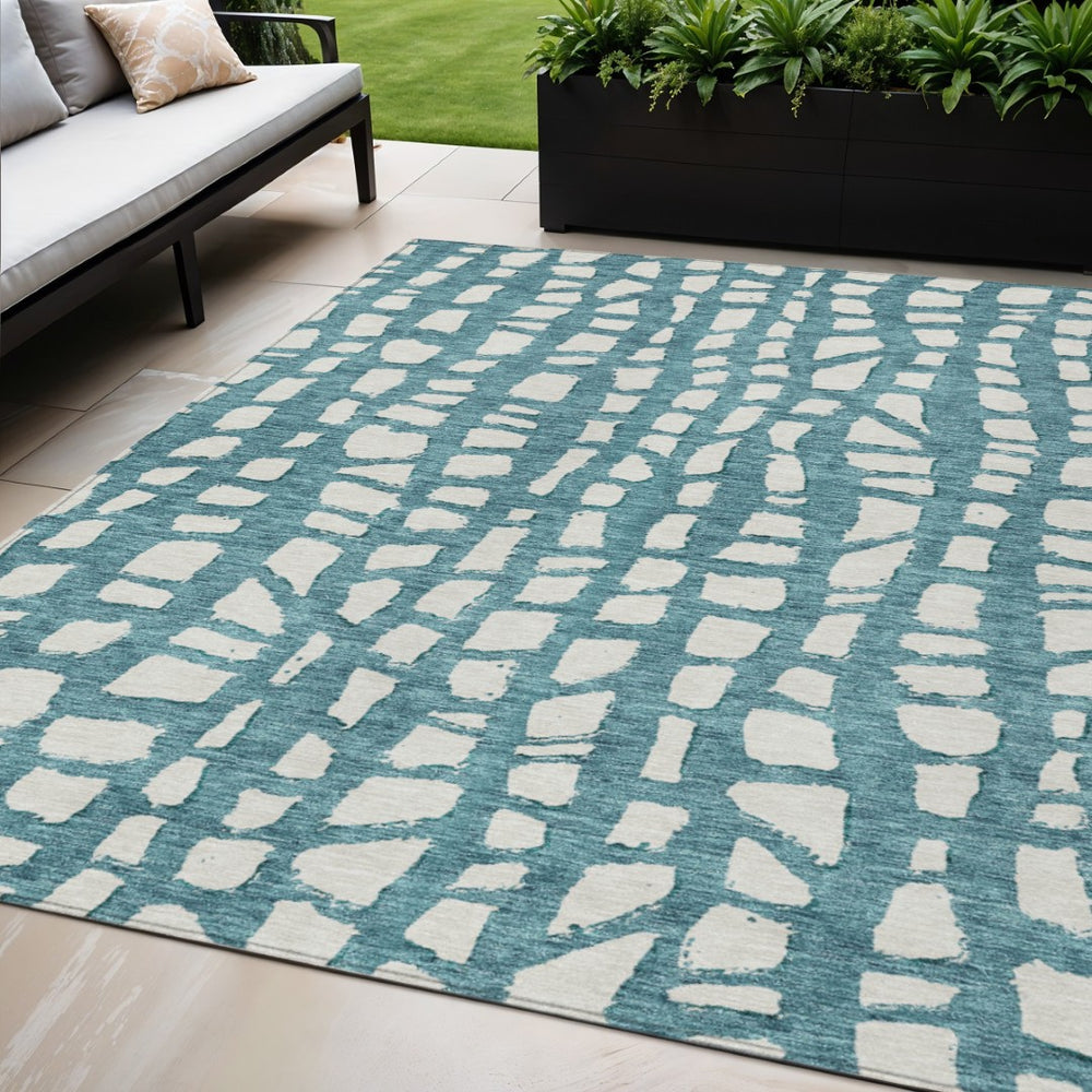 HomeRoots 5' Teal Blue and Ivory Abstract Area Rug - Washable, Stain-Resistant for Indoor and Outdoor Use 5' X 8' 585107
