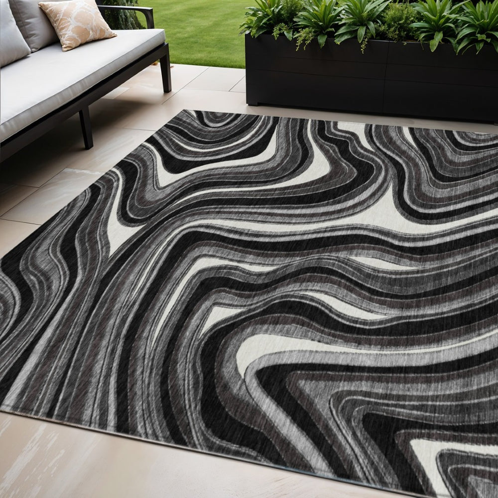 HomeRoots 5' Transform Your Space with a Modern Black Gray White Abstract Washable Area Rug for Indoor Outdoor Use 5' X 8' 585191