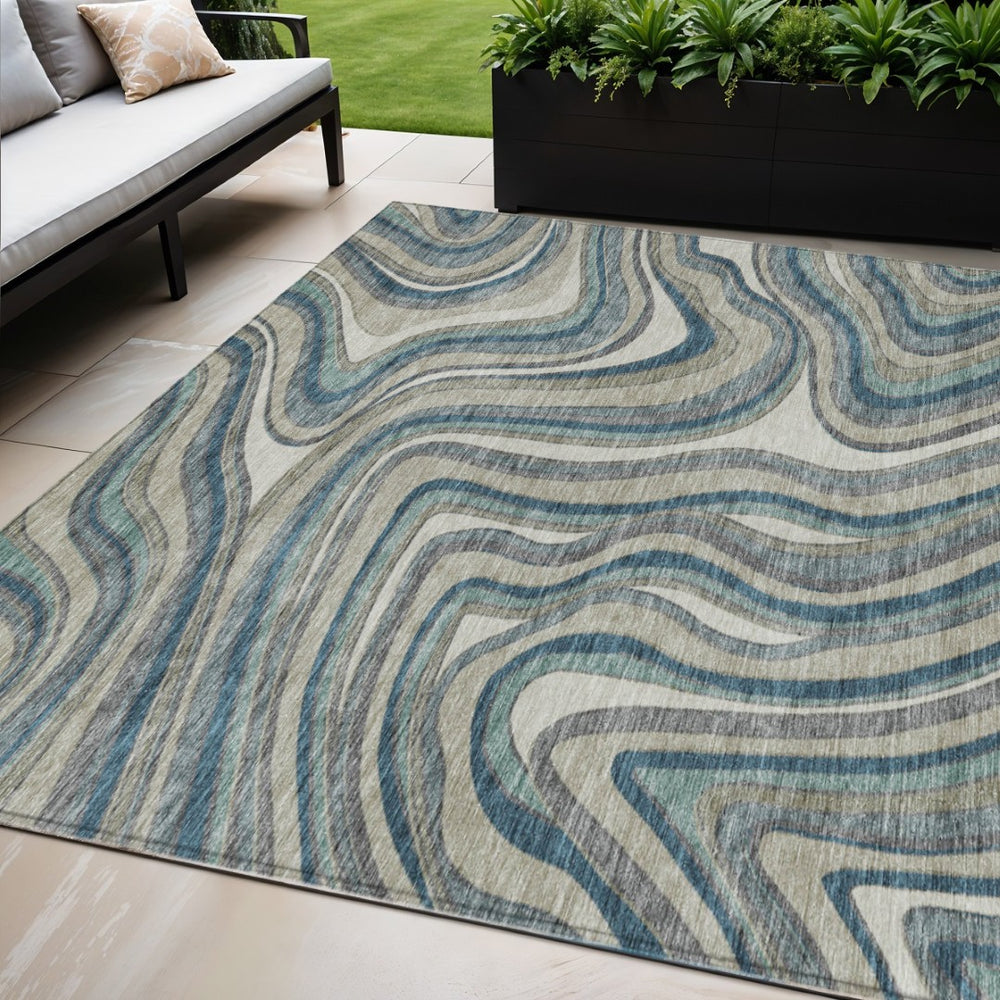 HomeRoots 5' Abstract Washable Area Rug in Teal, Blue, Gray & Taupe – Perfect for Indoor or Outdoor Spaces! 5' X 8' 585245