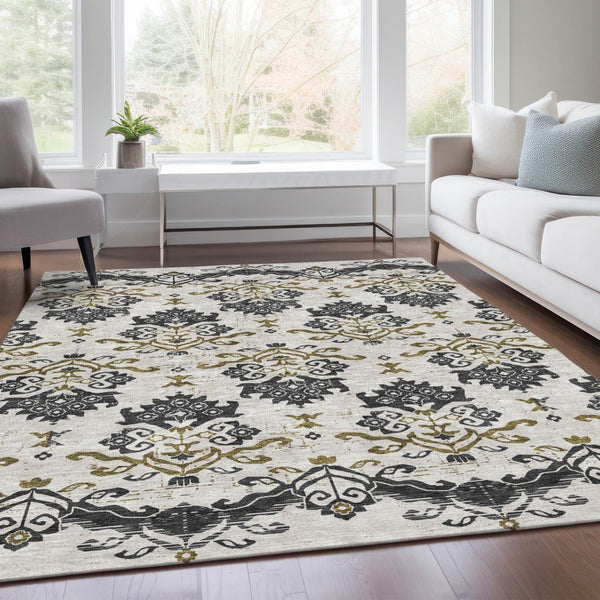 Homeroots 3' Stylish Beige Tan And Taupe Oriental Washable Area Rug For Indoor And Outdoor Spaces, Durable Design 9' X 12' Polyester 585404