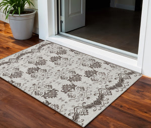 Homeroots 3' Stylish Beige Tan And Taupe Oriental Washable Area Rug For Indoor And Outdoor Spaces, Durable Design 3' X 5' Polyester 585412
